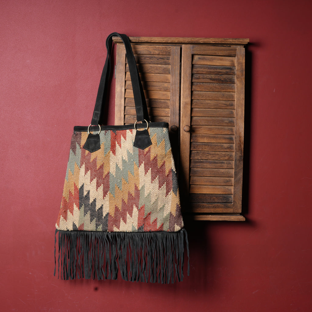 Hand made wool jute kilim art carpet bag with leather fringes