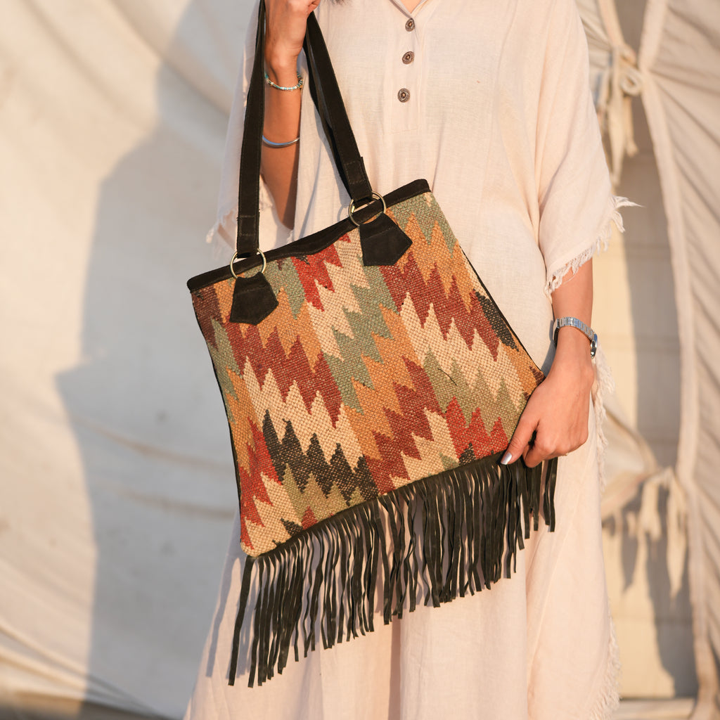 Hand made wool jute kilim art carpet bag with leather fringes
