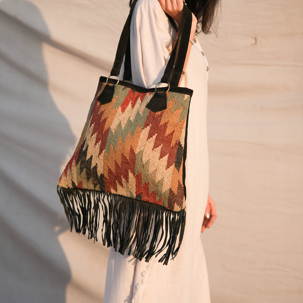 Hand made wool jute kilim art carpet bag with leather fringes